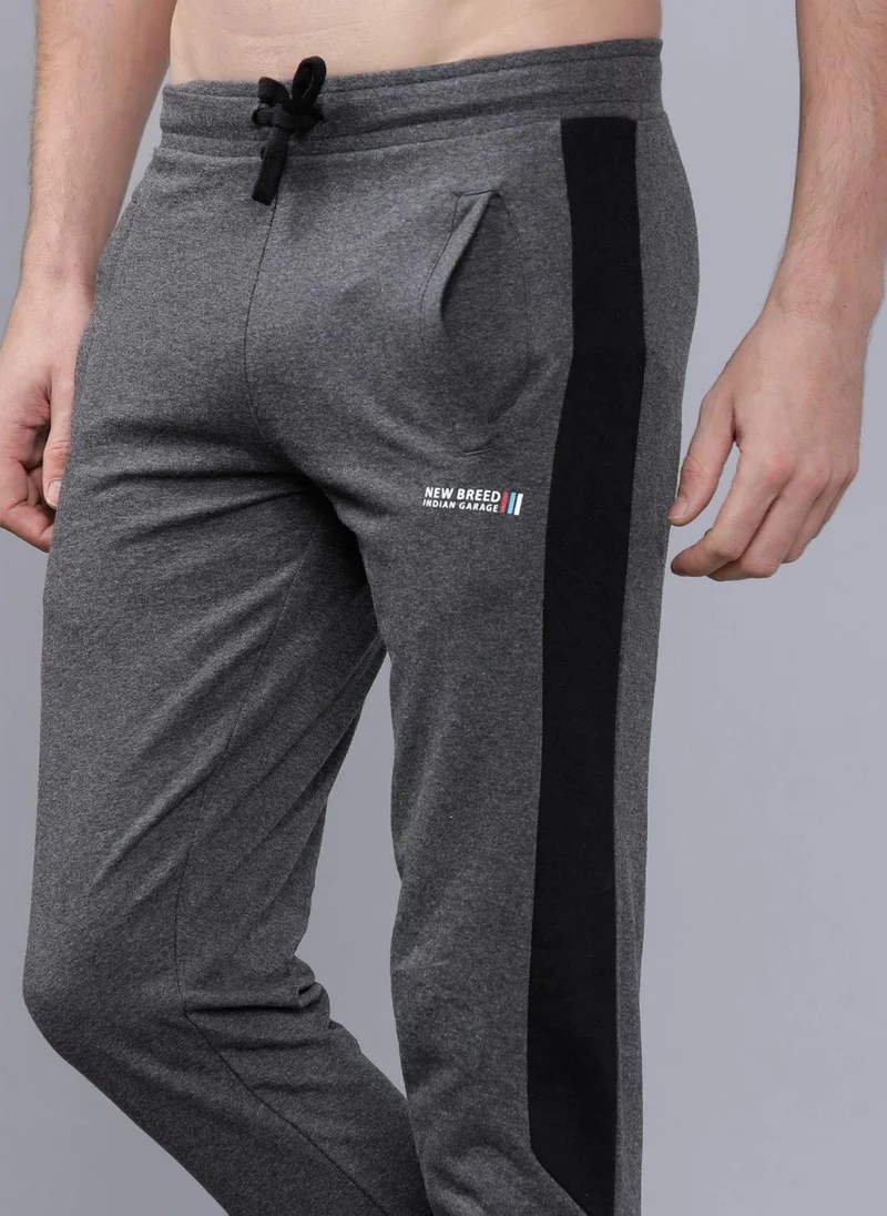 The Indian Garage Co Men Slim Fit Solid Mid-Rise Stretchable Knitted Jogger Trousers