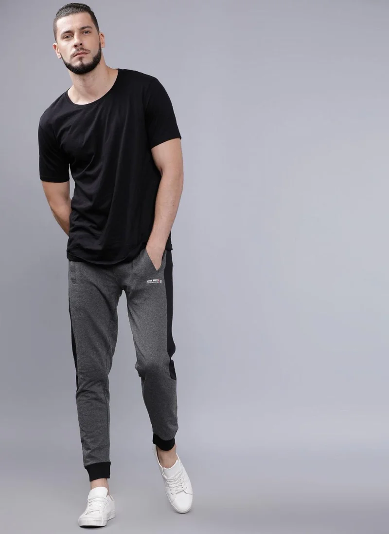 The Indian Garage Co Men Slim Fit Solid Mid-Rise Stretchable Knitted Jogger Trousers