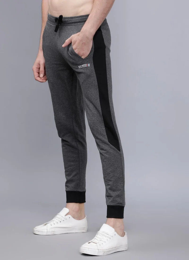 The Indian Garage Co Men Slim Fit Solid Mid-Rise Stretchable Knitted Jogger Trousers