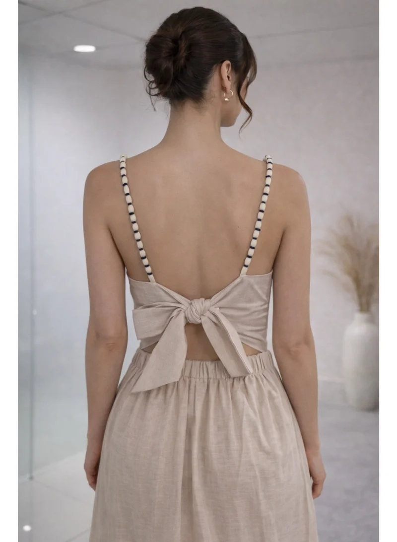2Trendy Women's Beige Linen Midi Dress with Beaded Straps and Palm Tree Embroidery