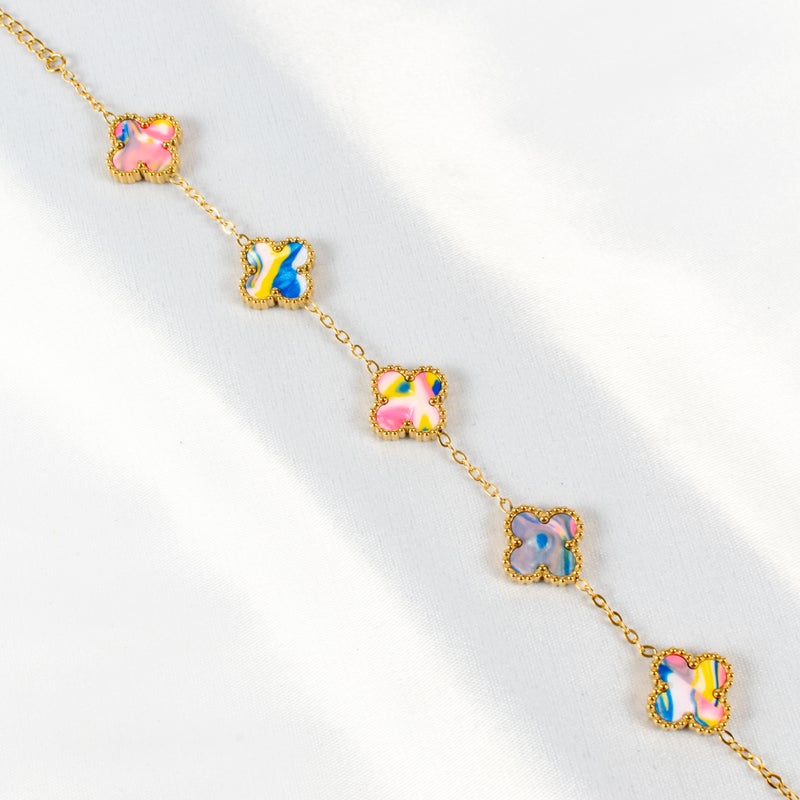 ذا بلاك بيرل اكسسوريز أنسيال أستانليس ستيل ذهبي مع شكل زهرة البرسيم بألوان خلابة - Image 2