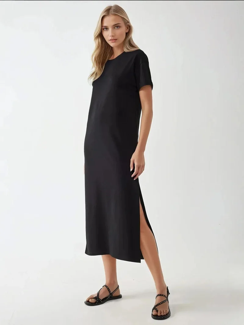 زوبعة فستان ميدي بقصة مريحة وياقة دائرية