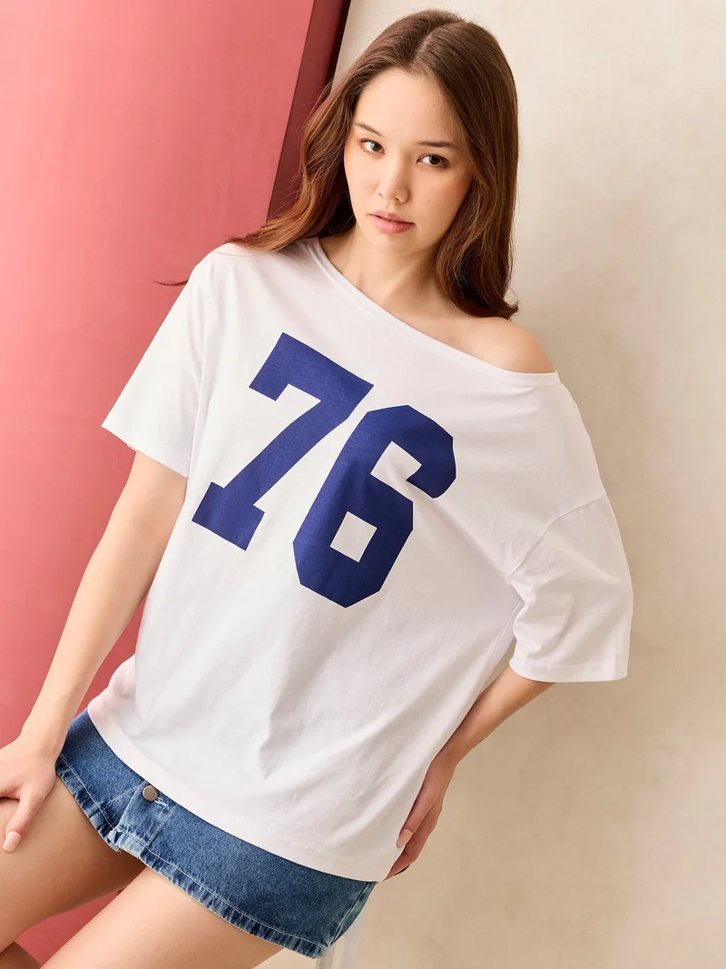 OUTZIDR White White Graphic Oversized T-Shirt for Women | Best Price UAE