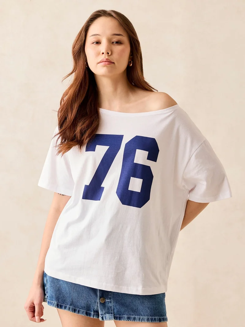 OUTZIDR White Graphic Oversized T-Shirt