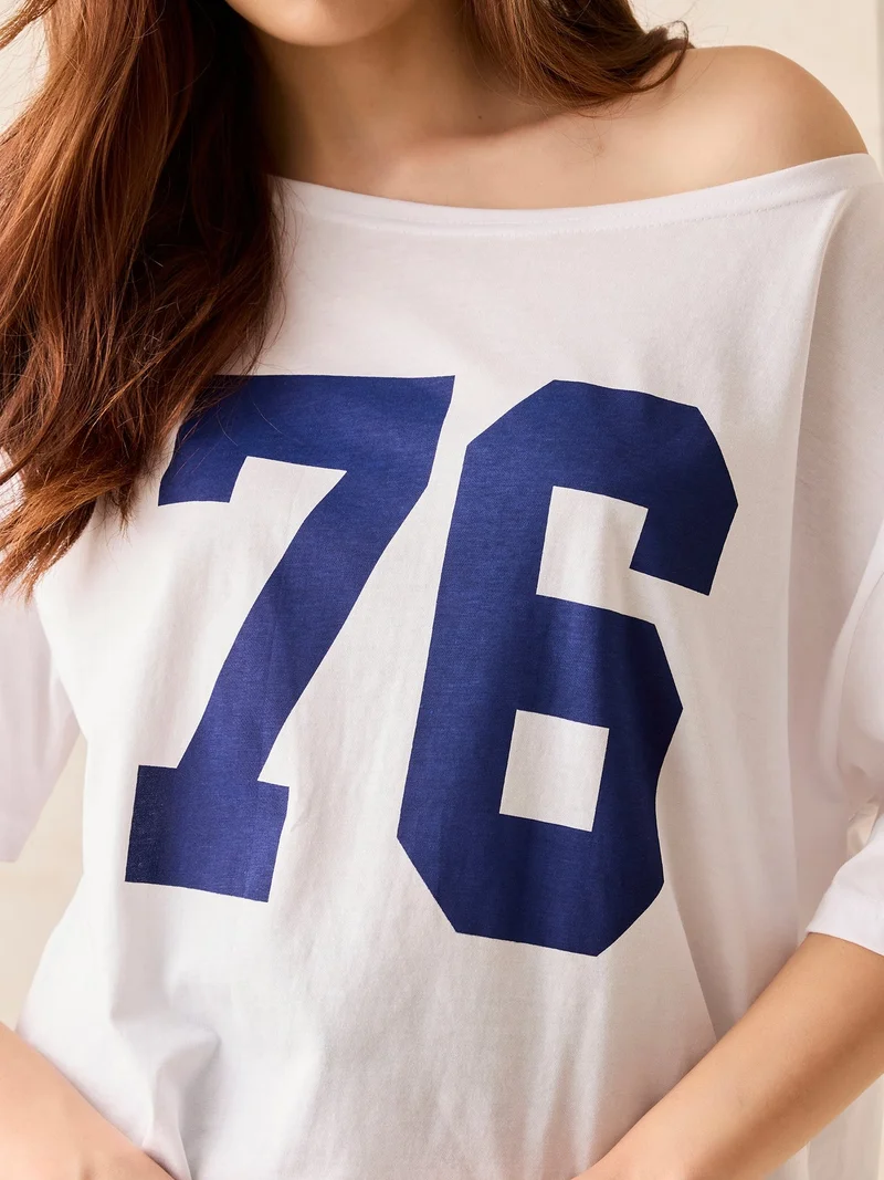 OUTZIDR White White Graphic Oversized T-Shirt for Women | Best Price UAE
