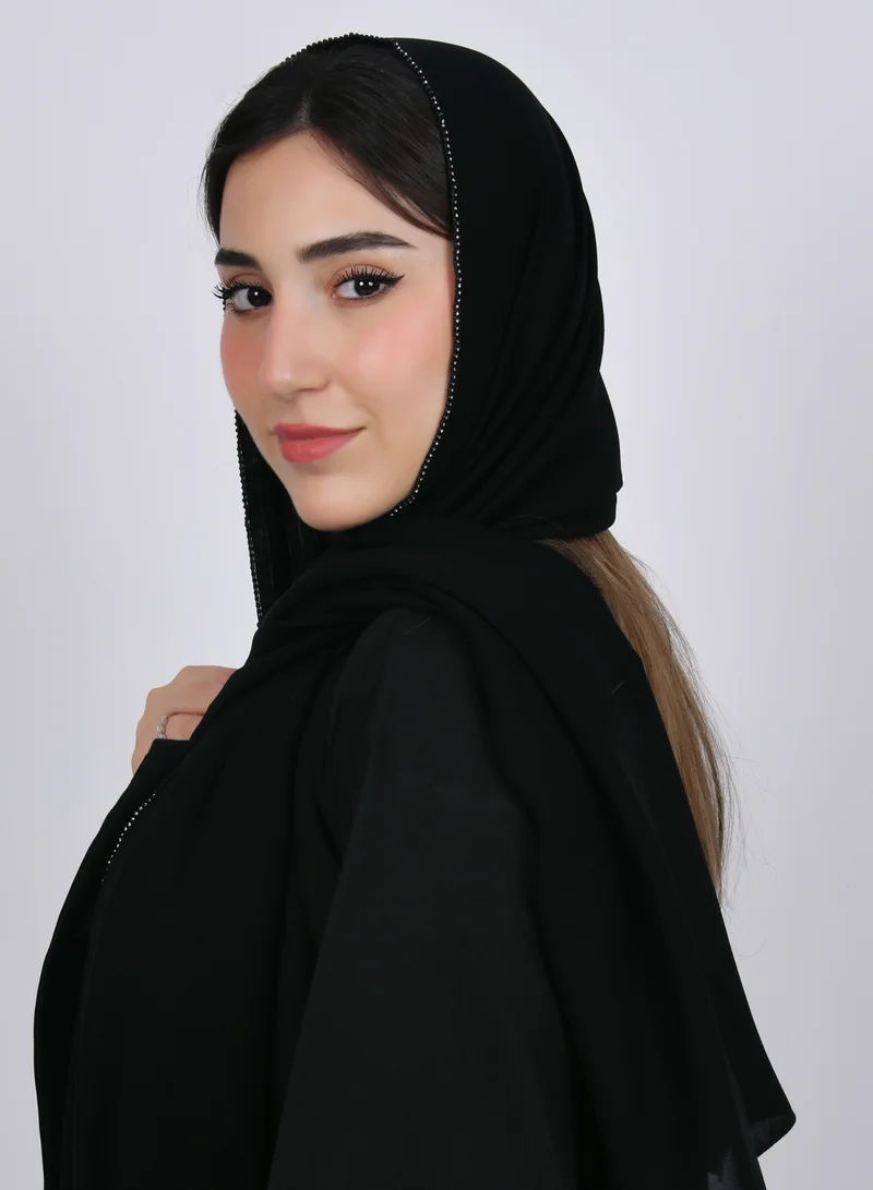 HAWRAA ABAYA A black silk veil decorated with a fine crystal line on the edges of the veil