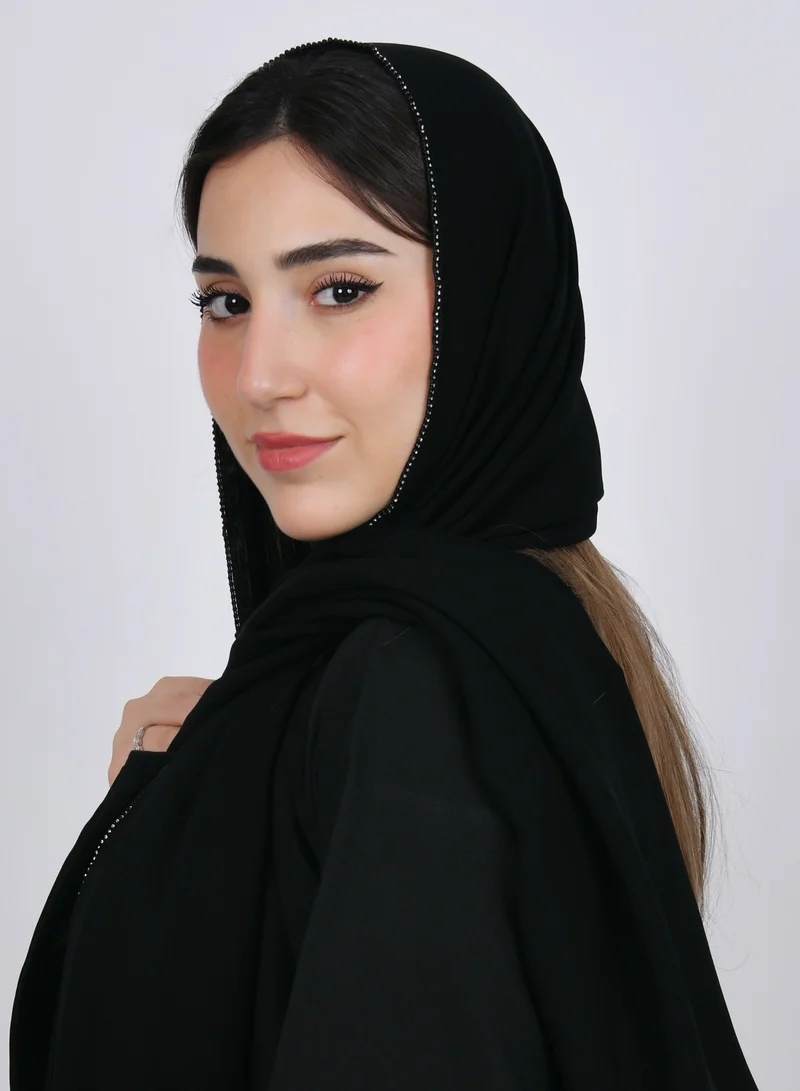 HAWRAA ABAYA A black silk veil decorated with a fine crystal line on the edges of the veil