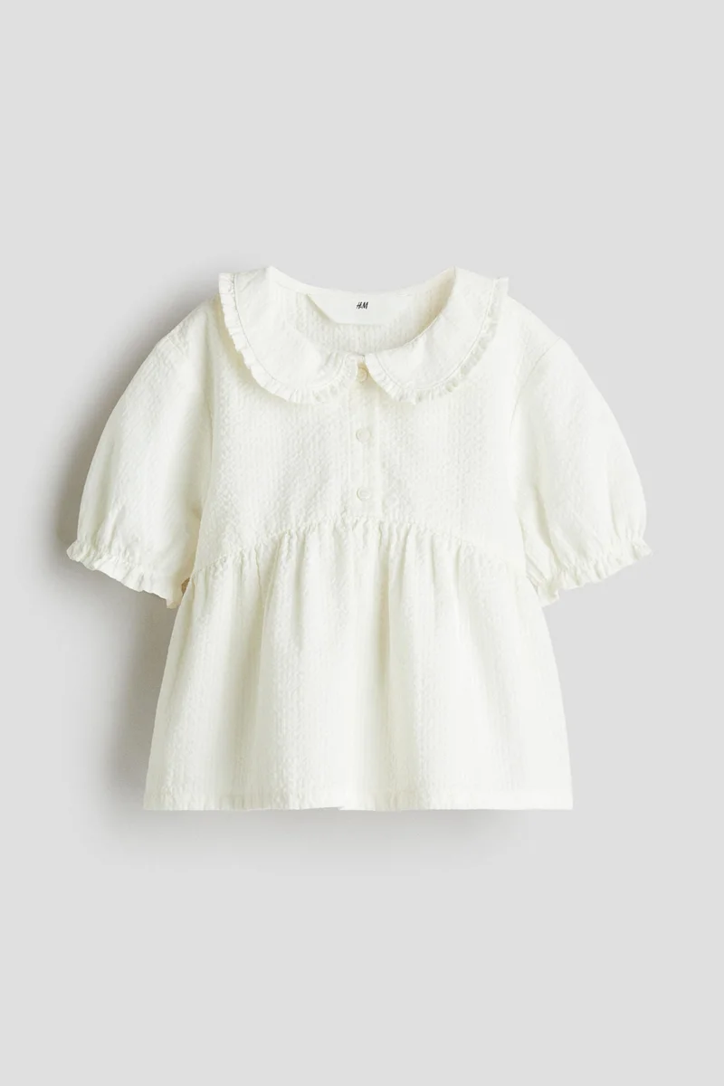 اتش اند ام بلوزة بحافة بيبلوم