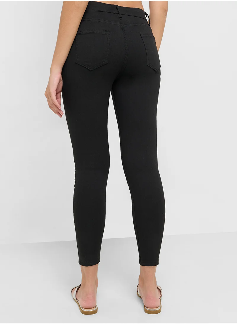 جينجر High Rise Distressed Skinny Fit Jeans