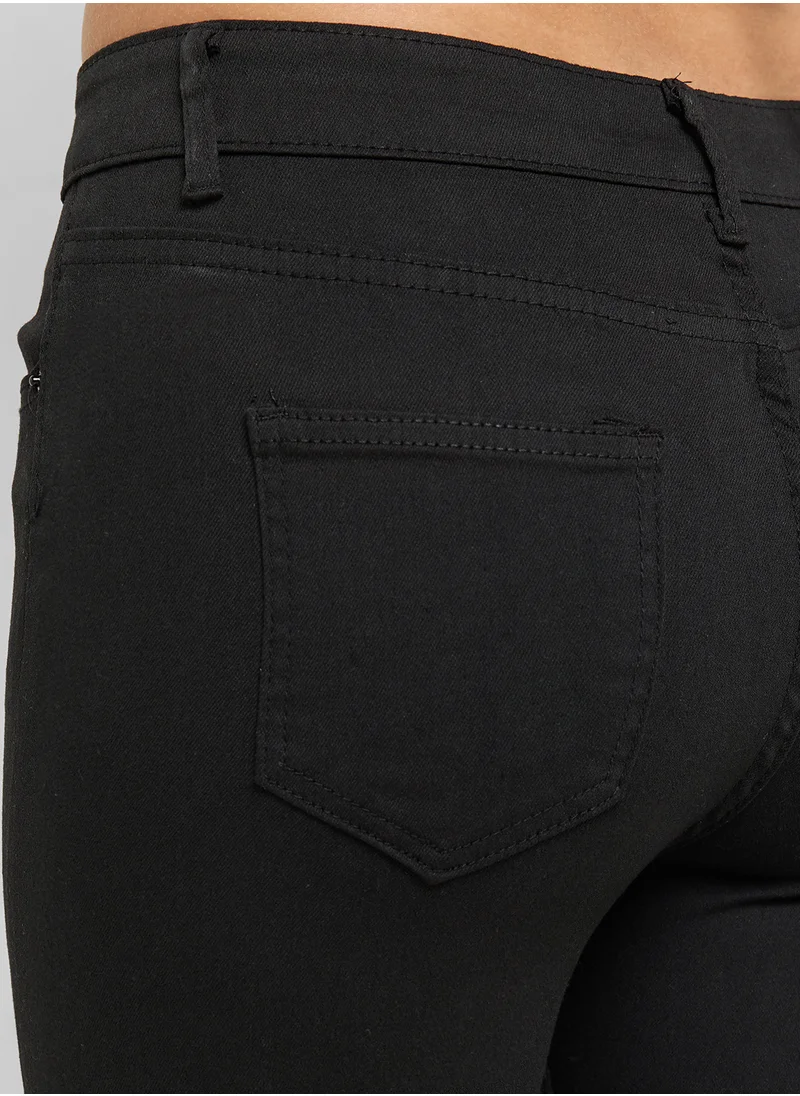 جينجر High Rise Distressed Skinny Fit Jeans