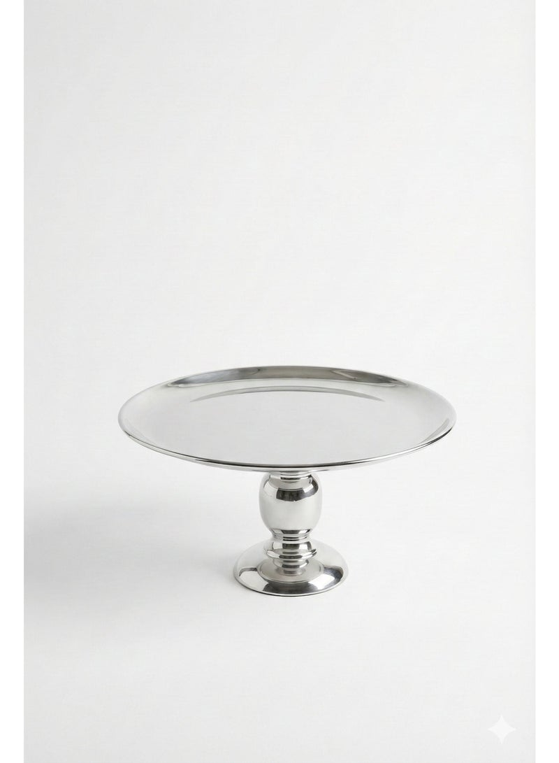 صينية تقديم مصنوعة من الستانلس ستيل، بتصميم دائري مرتفع على قاعدة مركزية ثابتة. تتميز بسطح لامع ومظهر أنيق، مناسبة لتقديم الحلويات أو التزيين في المناسبات. - Image 1