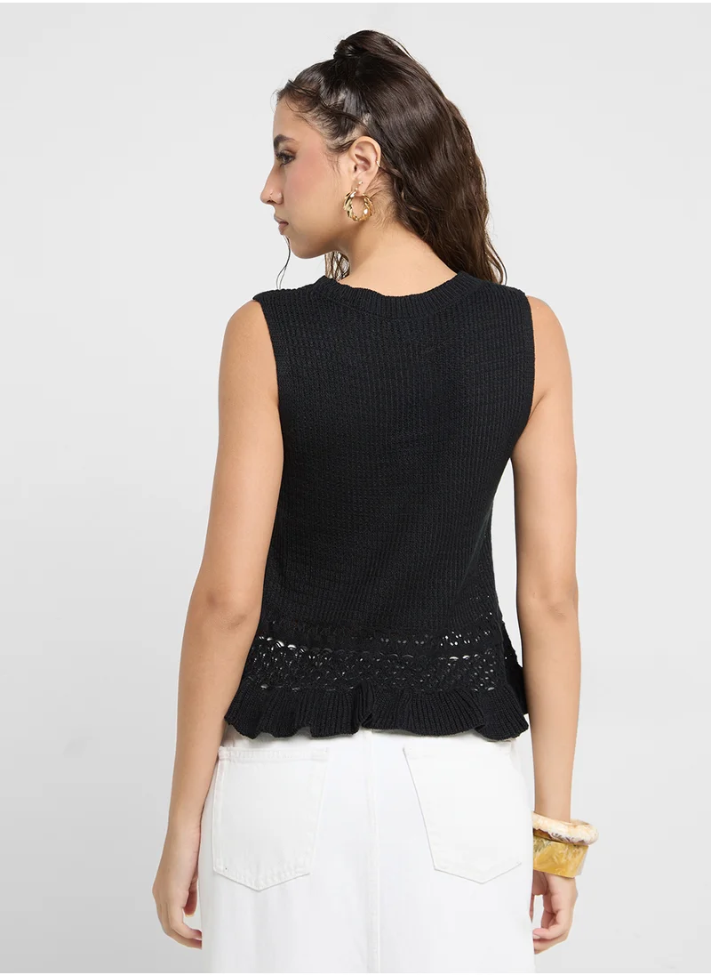 جينجر Sleveless Knit Sweater With Frill Hem