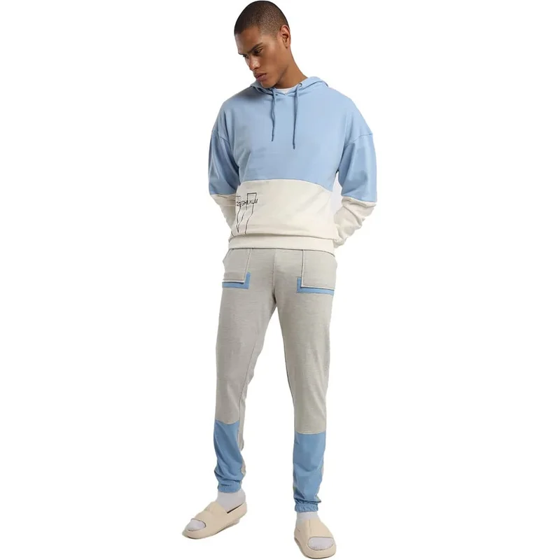 نوبيرو بنطلون رياضي رجالي من نوبرو بلون أبيض مطفي وأزرق