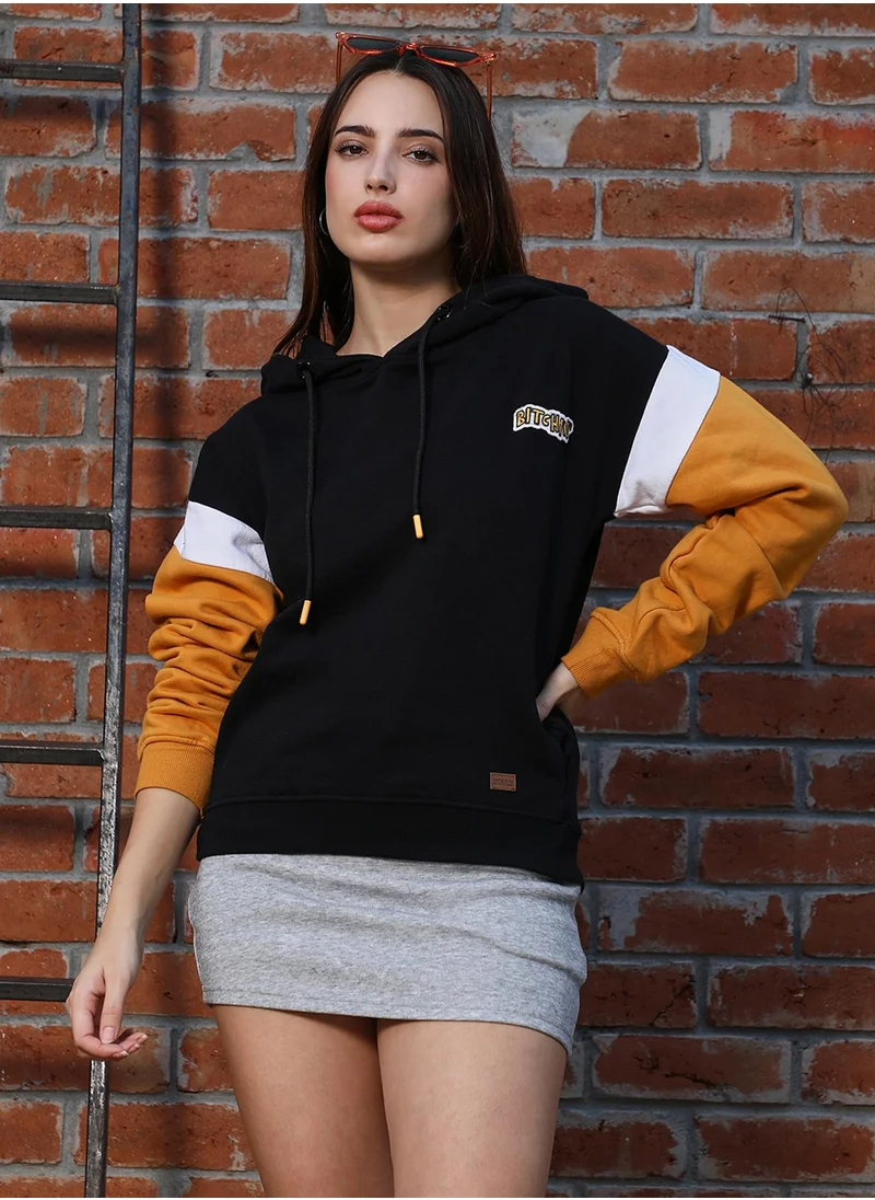 Campus Sutra Women's Mustard Yellow & Onyx Black Relaxed Block Pullover Hoodie