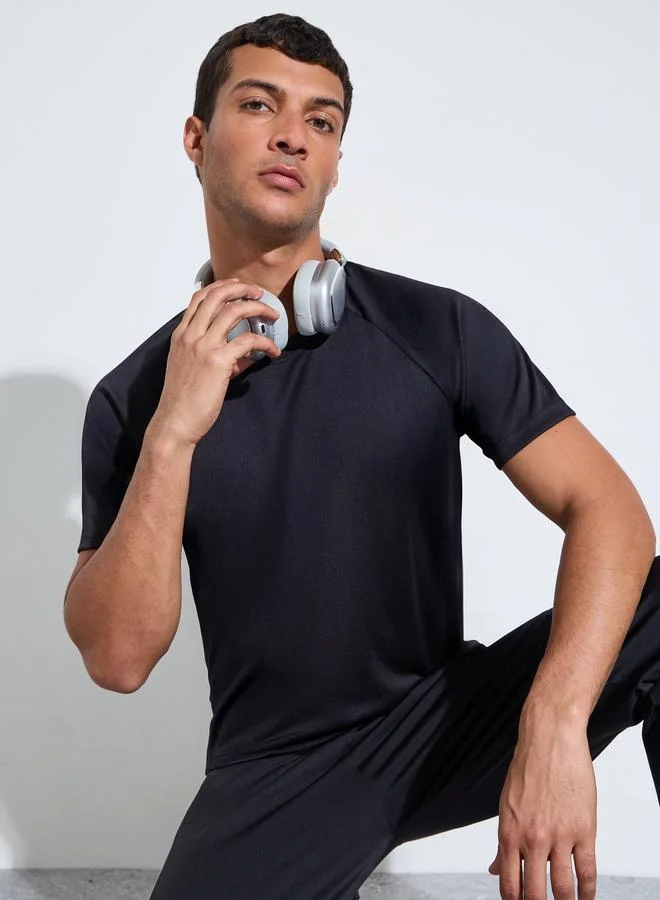 Styli Men Black Muscle Fit Running T-Shirt with Reflective Back Print
