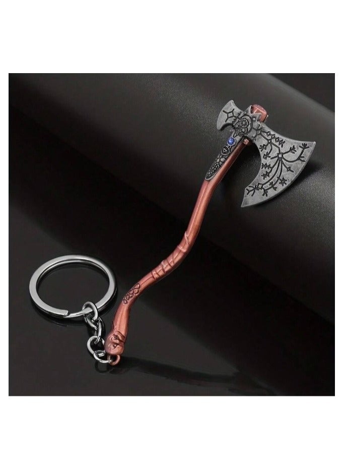 Generic A keychain in the shape of a warrior's axe, made of iron alloy, plated in a copper color, decorated and studded with blue rhinestones.  - Image 1