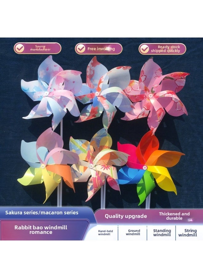null - Cherry Blossom Festival Windmill Macaron Plastic Kindergarten Dance Props Handheld Wooden Pole Rotating Insert To Decorate Windmill-Color:Colorful Rainbow 22cm With 40cm Pole 10 Pieces - Image 1
