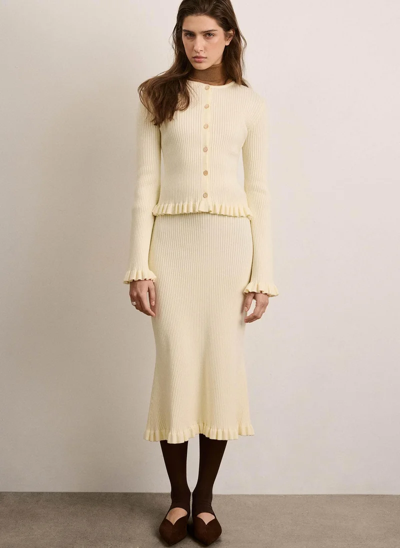 Ribbed midi knit skirt with ruffles