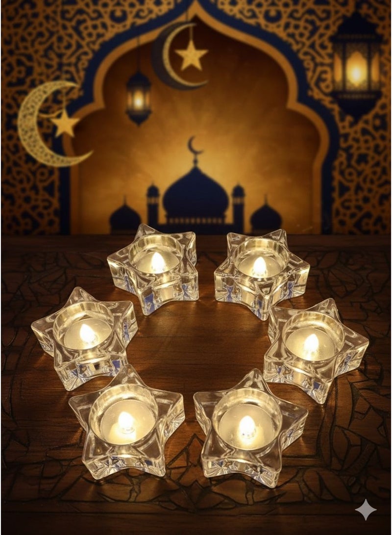 Two transparent five-pointed star-shaped Ramadan candles with yellow light. - Image 1
