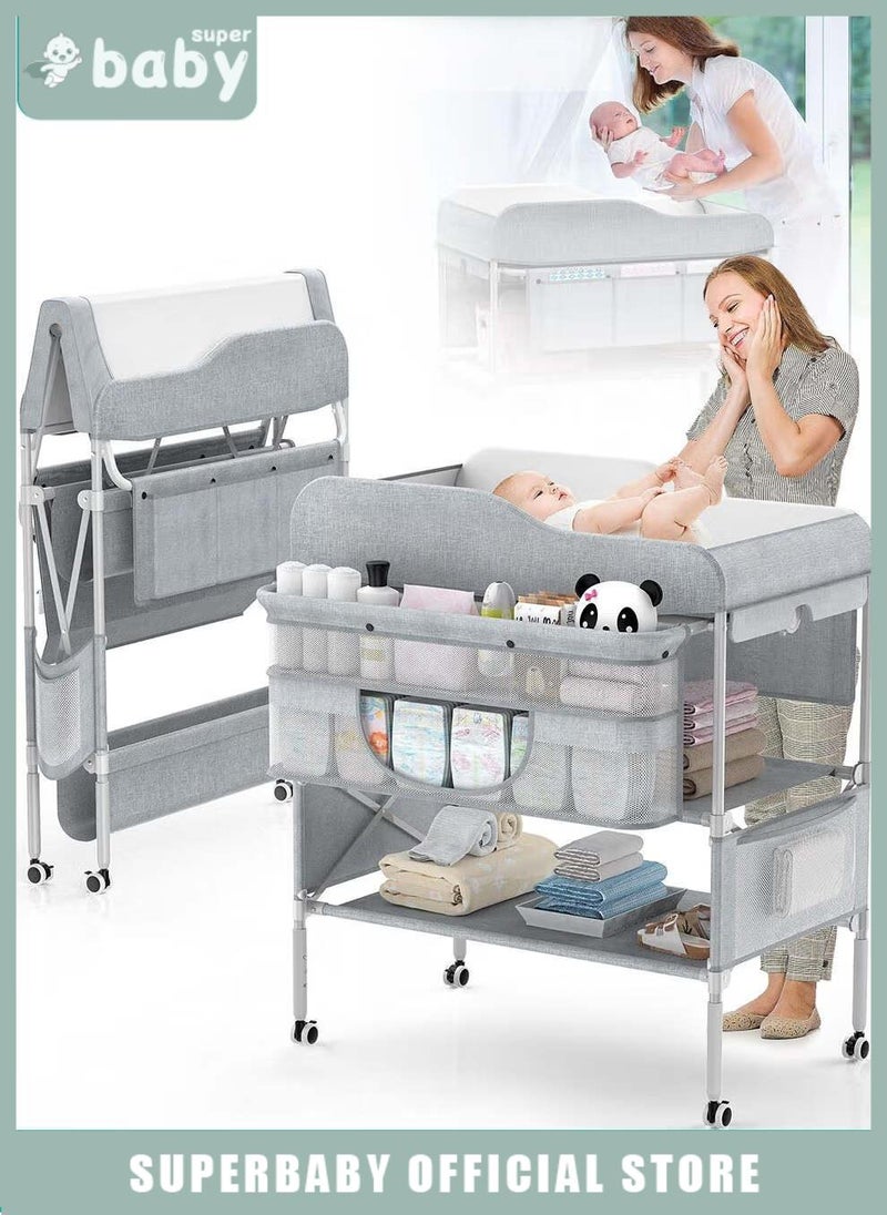 سوبر بيبي طاولة تغيير حفاضات الأطفال، محطة تغيير حفاضات الرضع قابلة للطي مع عجلات، منظم لغرفة الأطفال للأطفال الرضع، طاولة تغيير الحفاضات مع رف تخزين، هيكل مقوى و٣ ارتفاعات قابلة للتعديل - Image 1