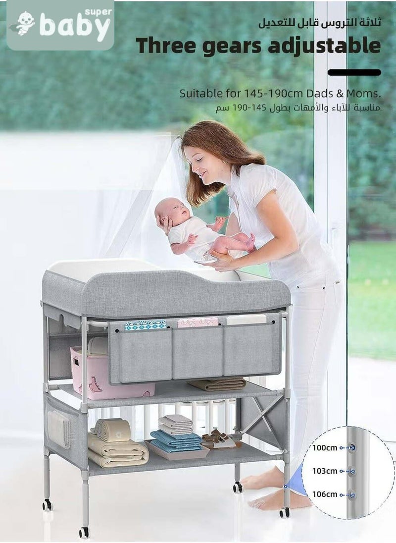سوبر بيبي طاولة تغيير حفاضات الأطفال، محطة تغيير حفاضات الرضع قابلة للطي مع عجلات، منظم لغرفة الأطفال للأطفال الرضع، طاولة تغيير الحفاضات مع رف تخزين، هيكل مقوى و٣ ارتفاعات قابلة للتعديل - Image 4