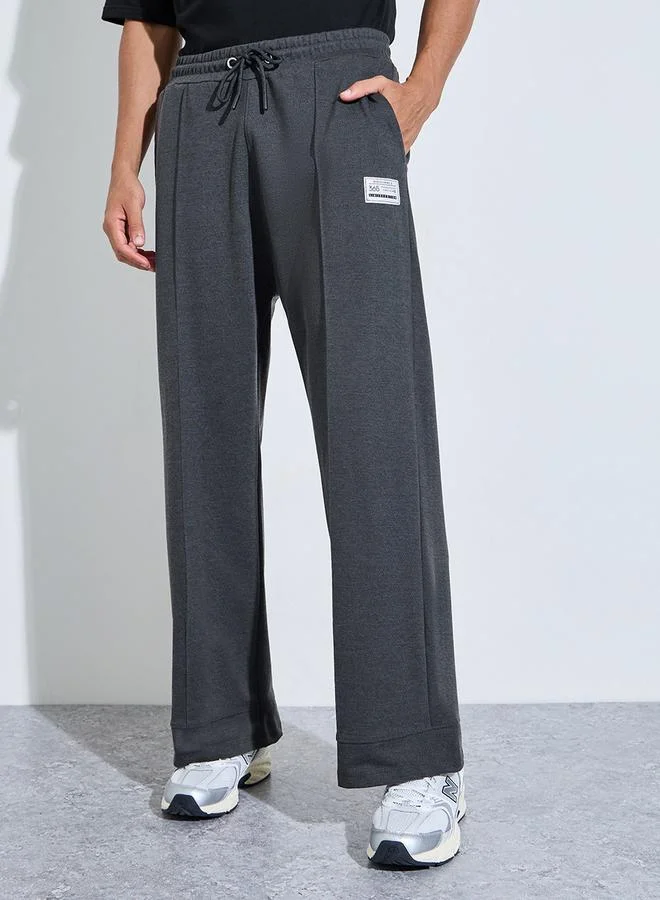 ستايلي Charcoal Pintuck Oversized Joggers with Badge Detail