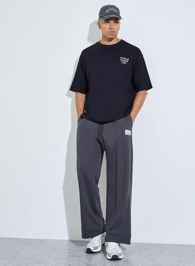 ستايلي Charcoal Pintuck Oversized Joggers with Badge Detail