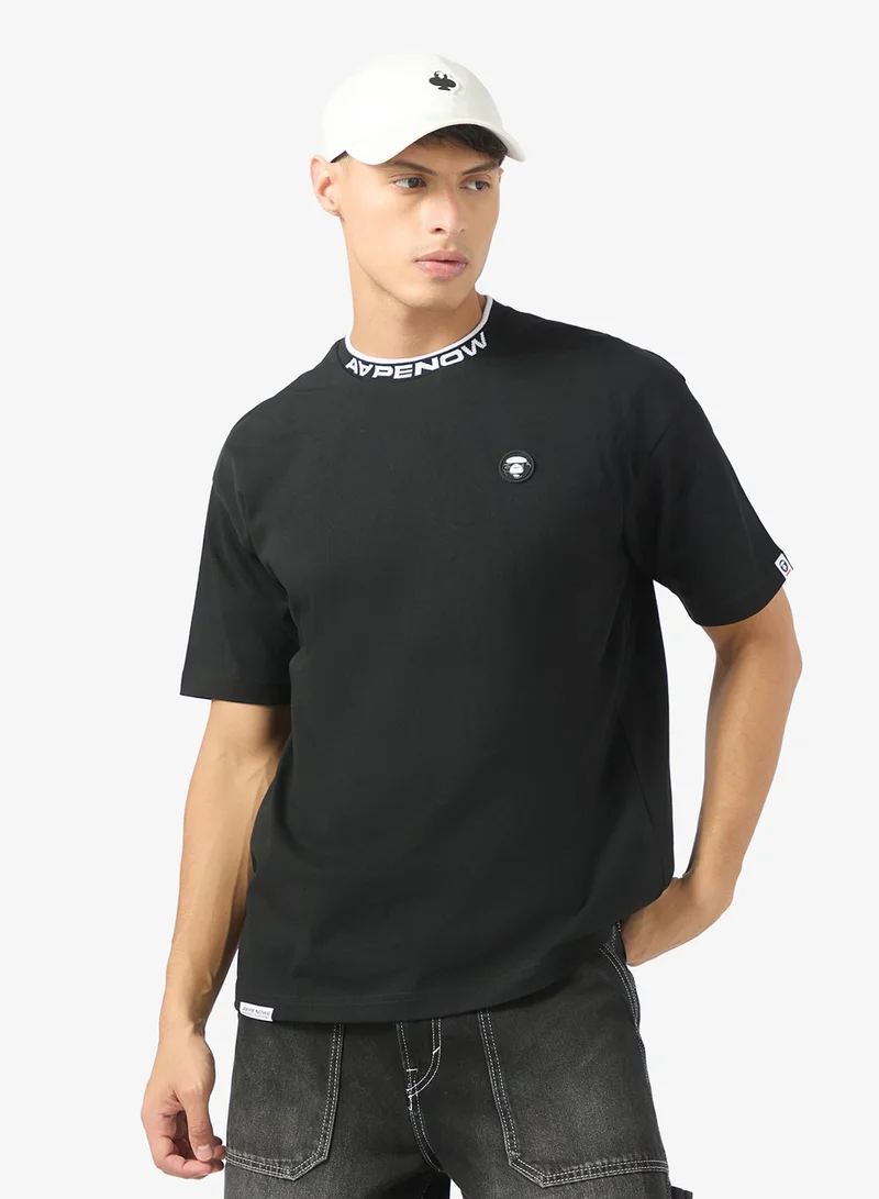 ايه ايه بي إي تي شيرت فضفاض بشعار وجه القمر من