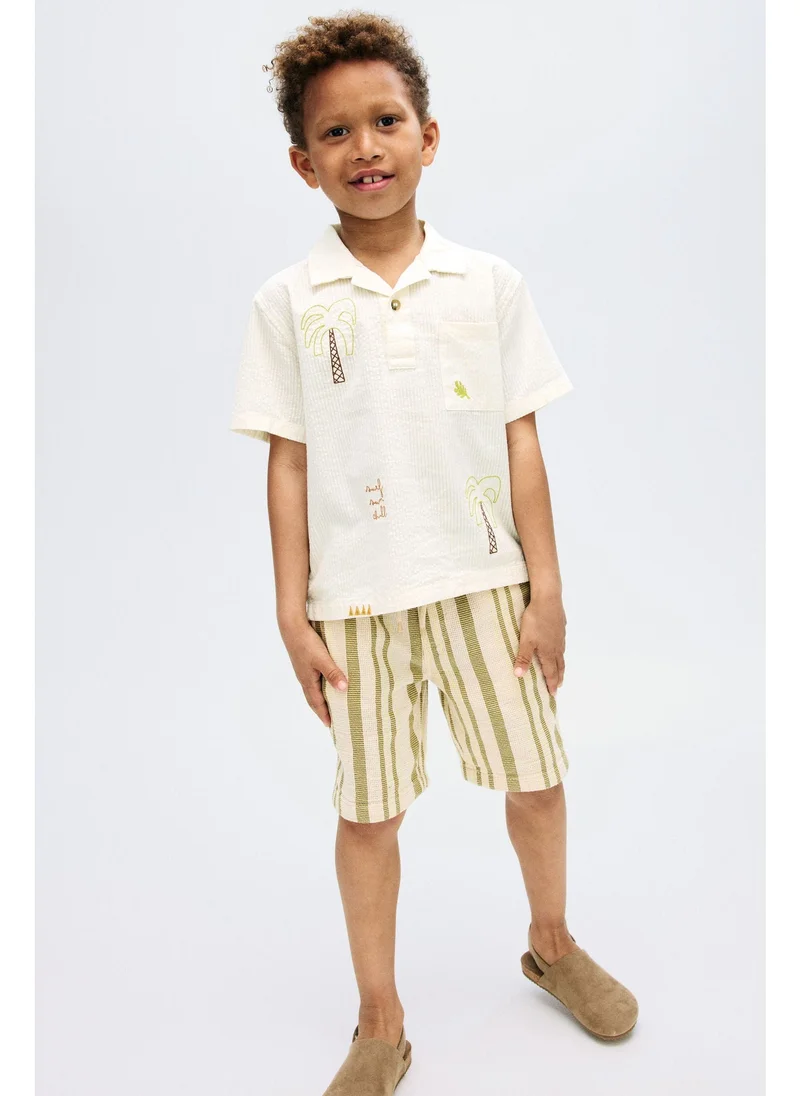 H&M Cotton seersucker polo shirt