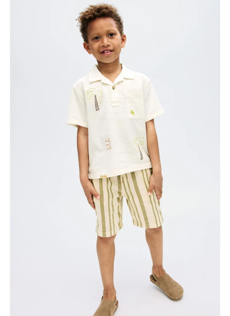 اتش اند ام قميص بولو قطني سيزوكر