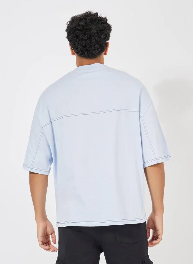 ستايلي Boxy Fit Contrast Stitch T-Shirt with Graphic Pocket