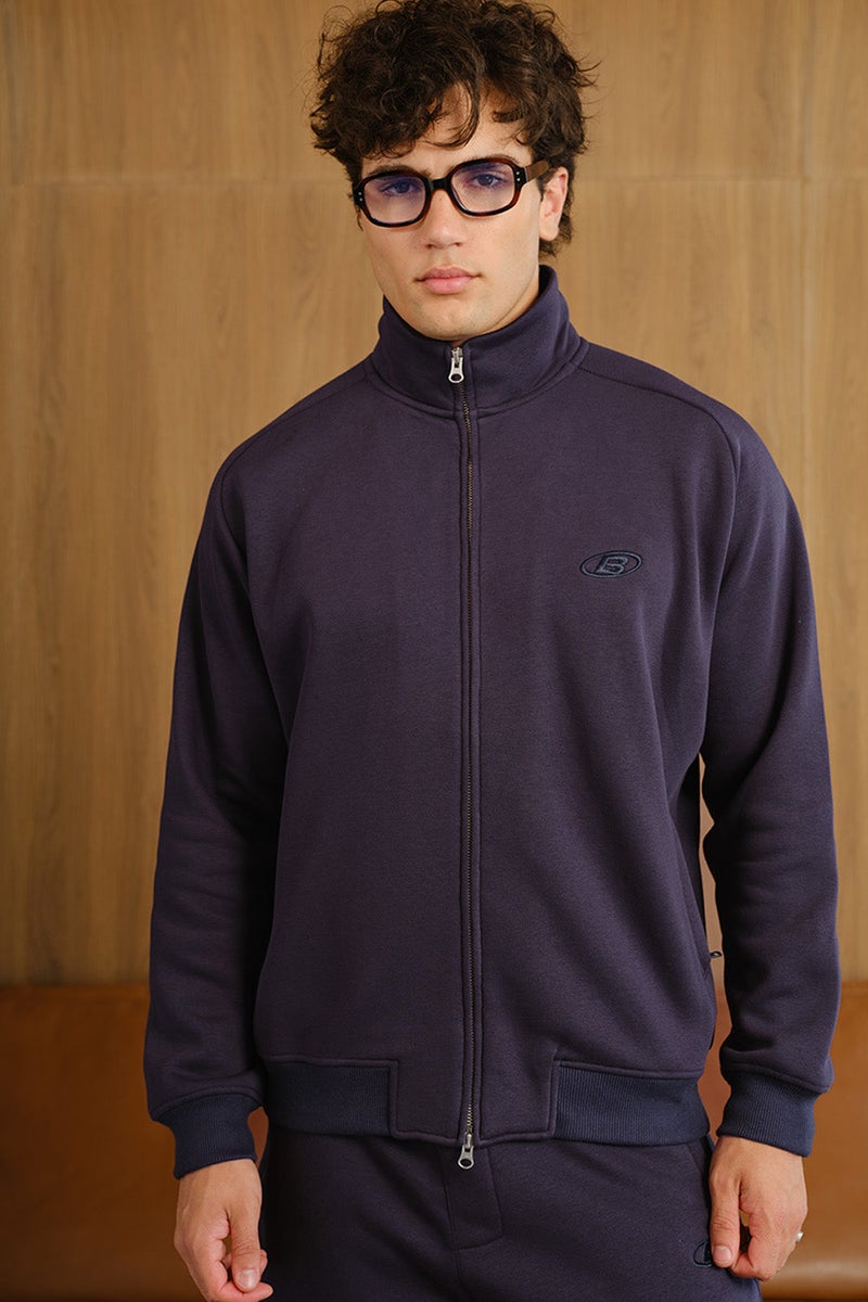 Bonkers Corner جاكيت زيبير ذو ياقة عالية باللون الأزرق للرجال - Image 1