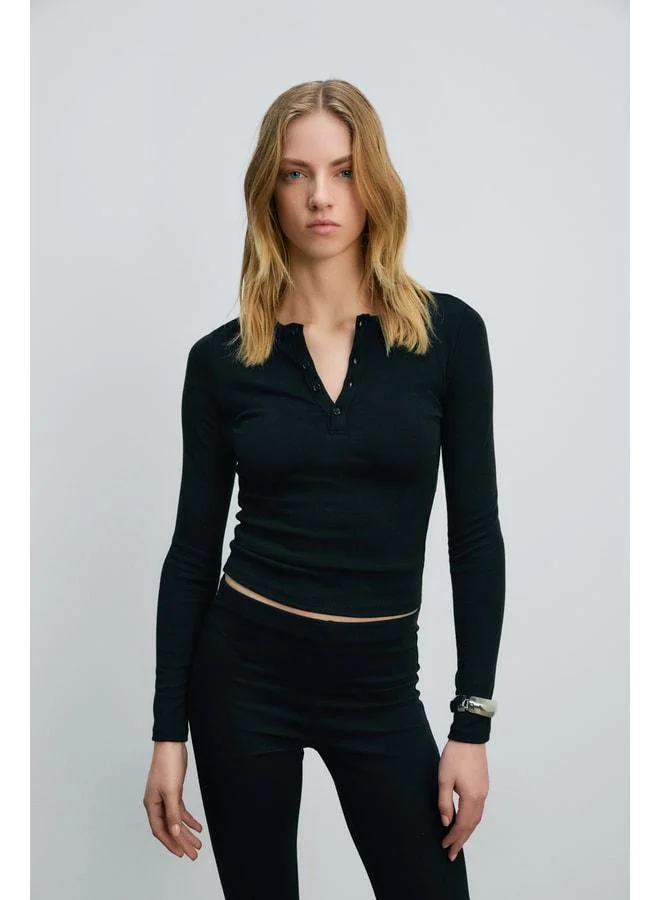 GRIMELANGE CIELO Women's Round Neck Front Half-Opening Functional Button Long Sleeve Black Blouse.