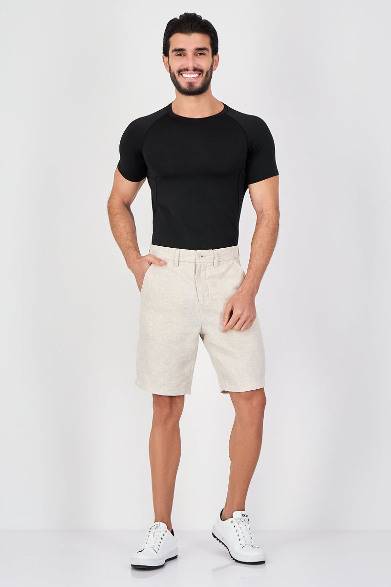 Celio شورتات تشينو صلبة للرجال، بيج - Image 4