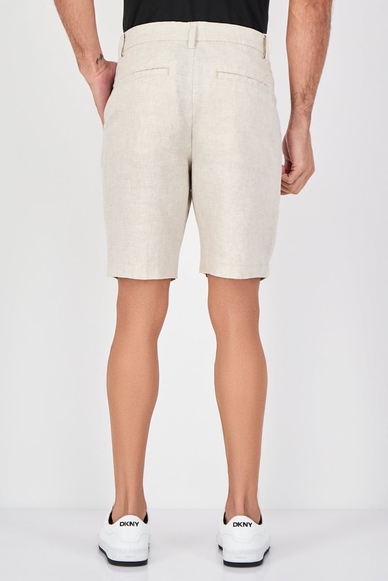 Celio شورتات تشينو صلبة للرجال، بيج - Image 3