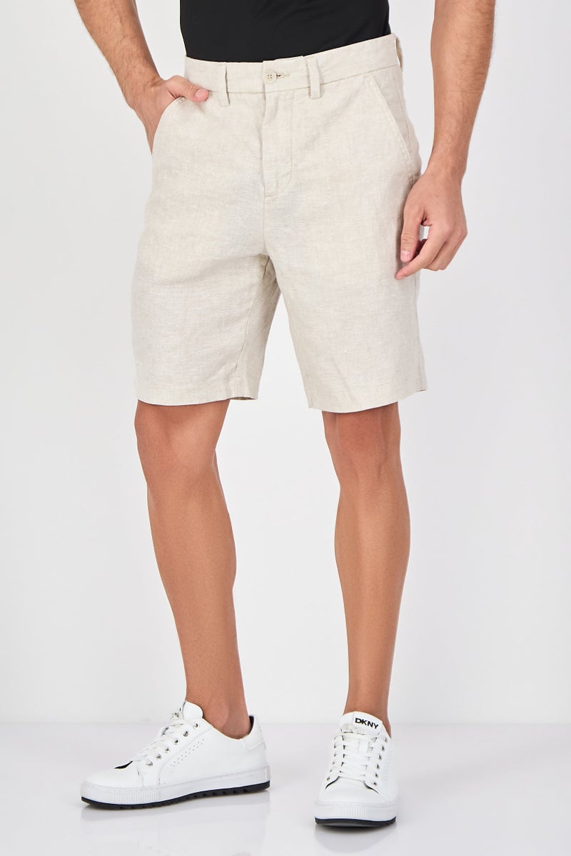 Celio شورتات تشينو صلبة للرجال، بيج - Image 1