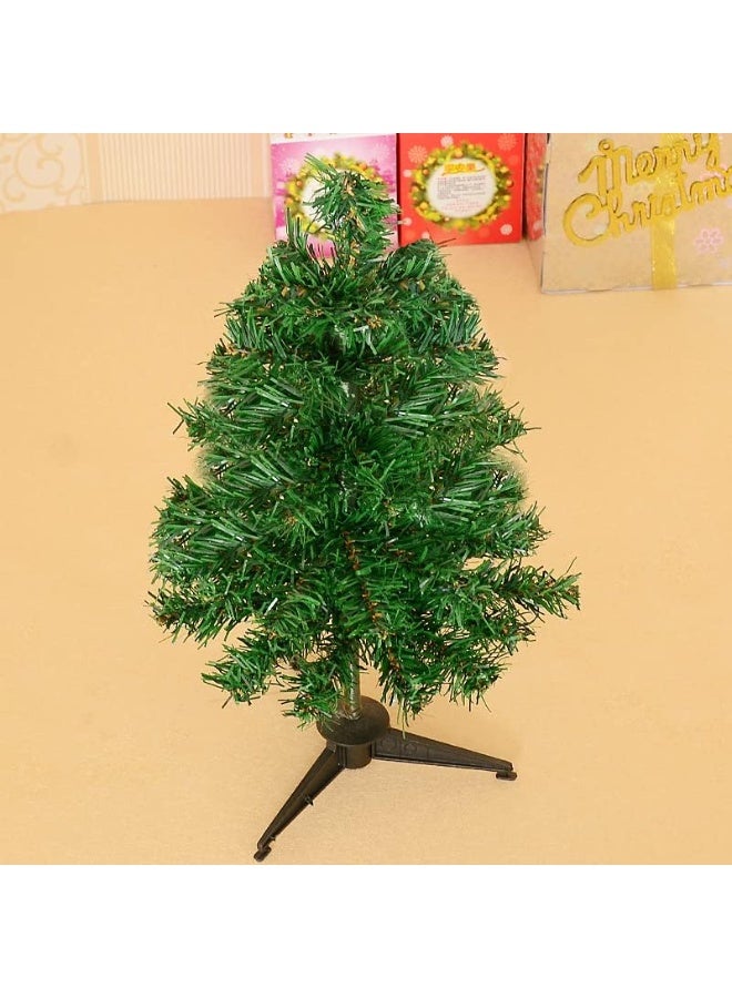 The long-awaited Christmas trees, the regular green tree, with a soft metal pole for movement and a plastic seat. Size: 30 cm + 10 toys that decorate the tree + a 1.5-meter yellow LED string. - Image 2