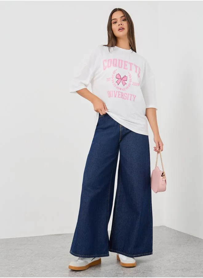ستايلي Styli Graphic Print Round Neck T-Shirt