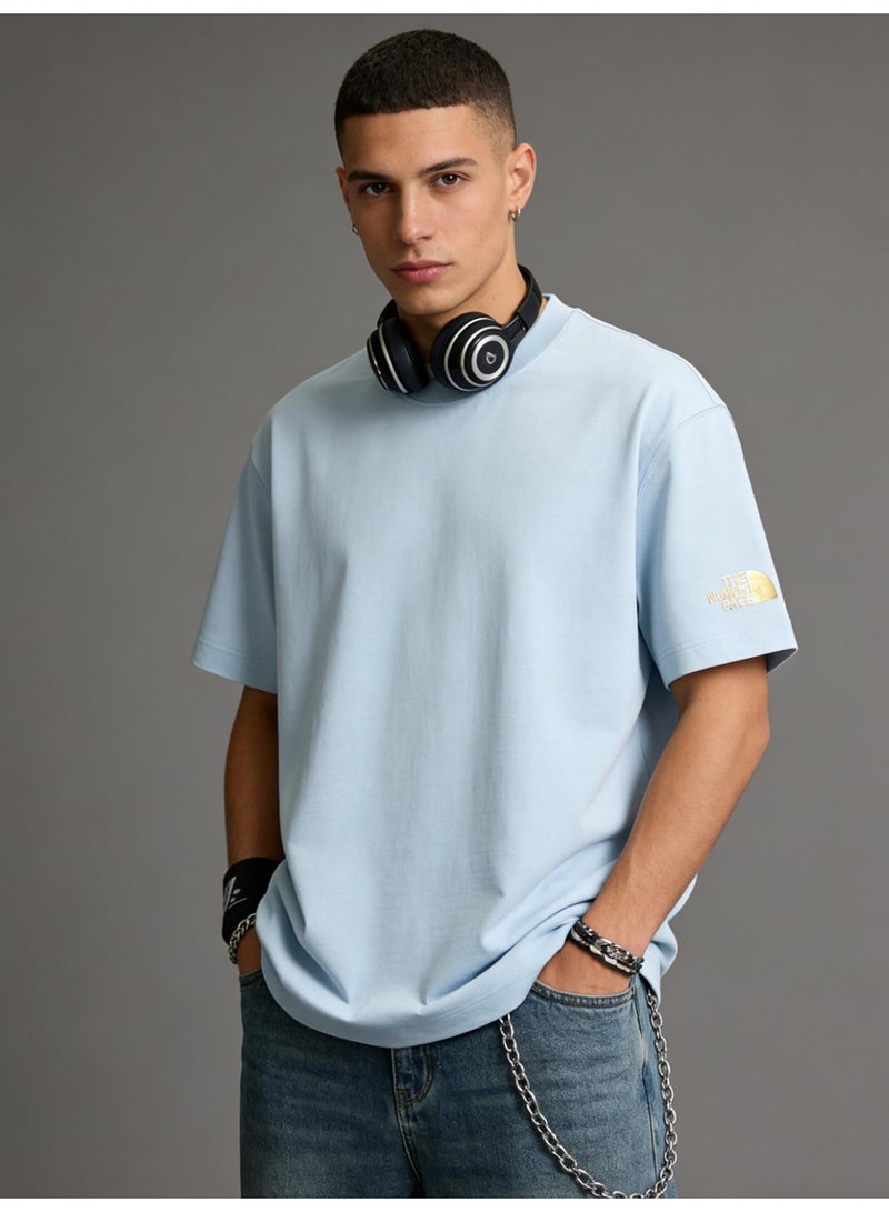 THE NORTH FACE Men's and women's T-shirts with the same style in the north face, high-grade cotton loose short sleeves with golden logo, retro street clothes for men and women. - Image 1