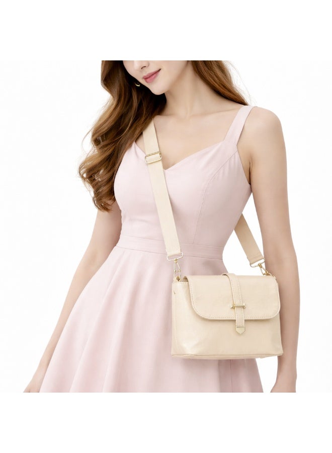 A classic women's crossbody bag crafted from premium genuine leather, featuring a stylish flap design, a distinctive silver metal clasp, and a wide, adjustable strap.