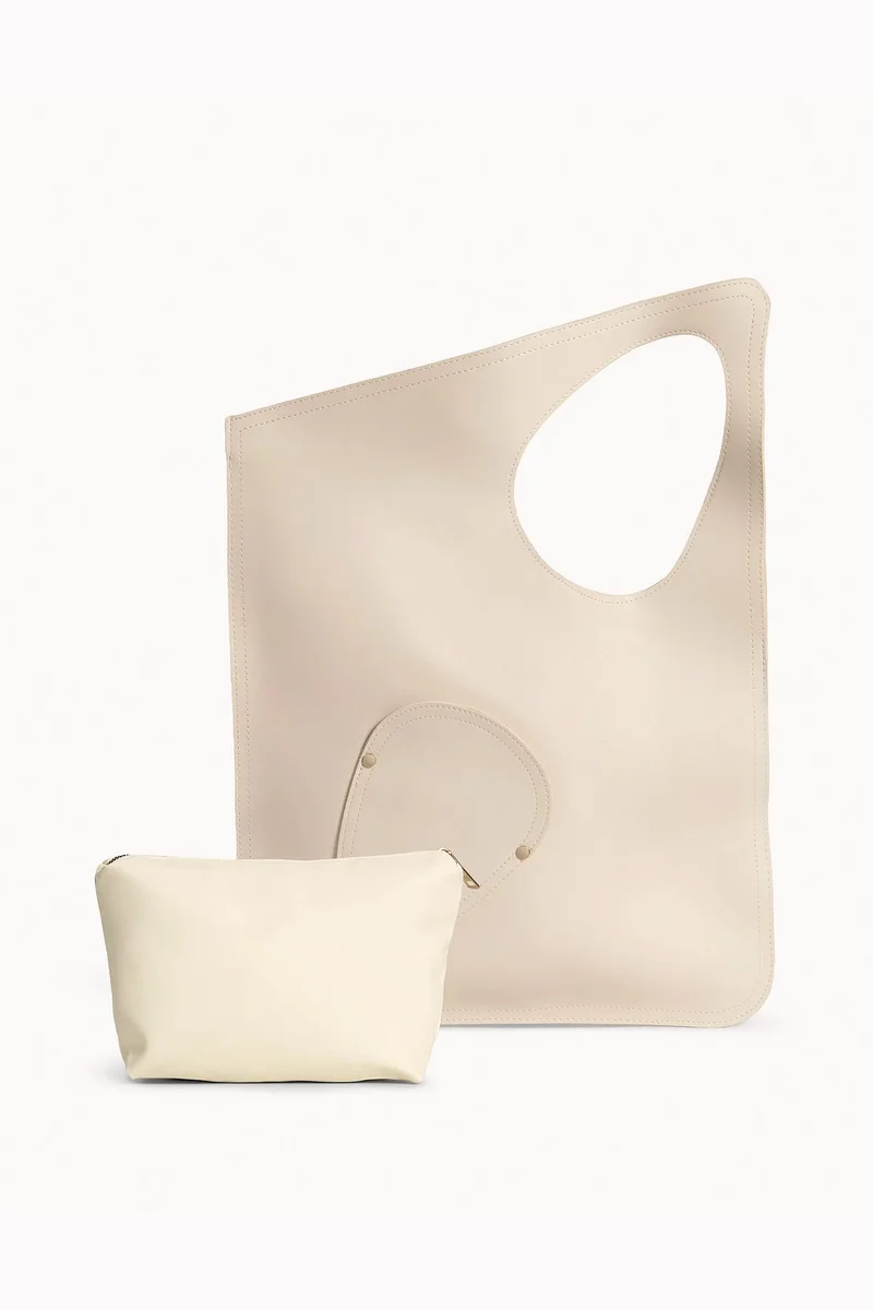 Wecre8 Beige Asymmetrical Tote Bag by WECRE8