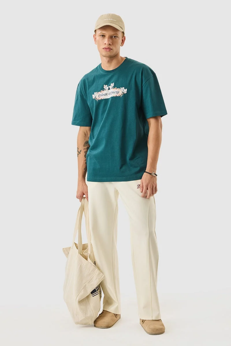 SNITCH Teal Teal Graphic Half Sleeve Oversized Streetwear T-Shirt for Men | Best Price UAE