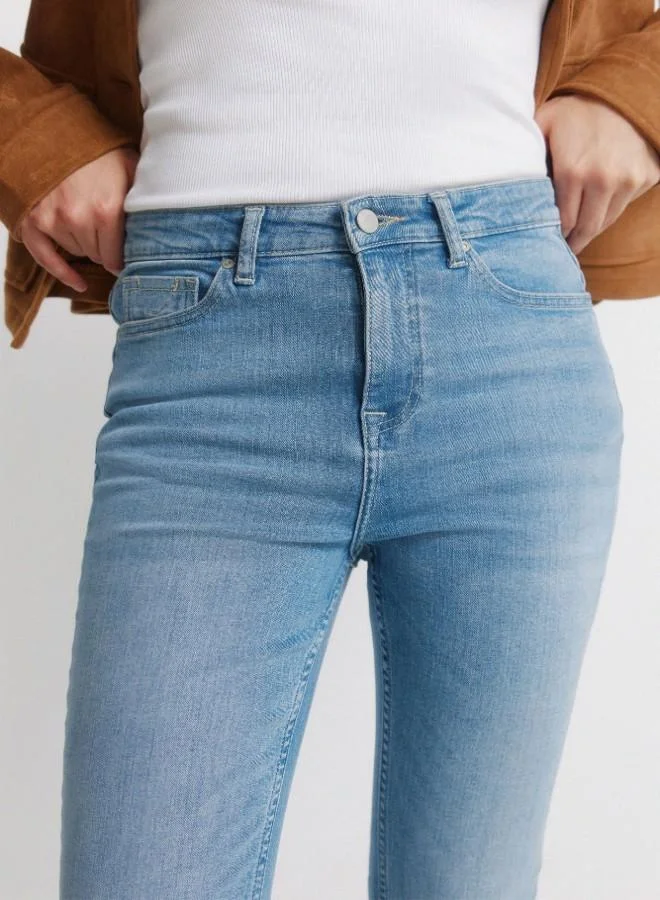 Springfield  High-waisted jeans with front and back pockets, button and zip fastening fastening , and a slim fit with a flared hem . These jeans feature a state-of-the-art washing process that reduces water, chemical, and energy consumption. for Women | Best Price UAE