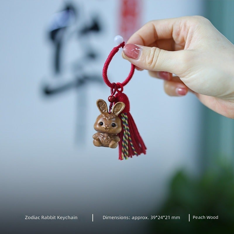 Cute Wood 12‑Zodiac Animal Keychain Pendant,Hand‑Carved Wooden Tassel Bag Charm Hanging Ornament Gift - Image 1