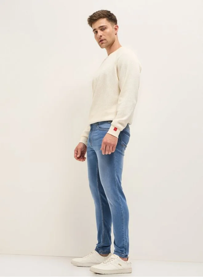 The Bear House  Men's Light Blue with Light Fade Mid-Rise Skinny Fit Jeans Classic Comfort With Modern Style, Perfect For Everyday Casual Looks And Effortless Streetwear Vibes for Men | Best Price UAE