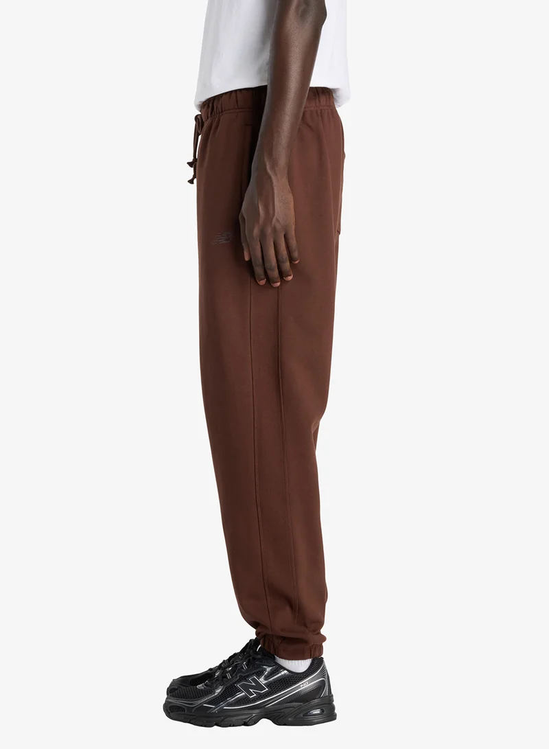 New Balance PUMPERNICKEL (ABJ) Athletics French Terry Joggers for Men | Best Price UAE