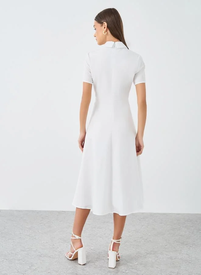 ستايلي فستان ميدي مطرز بالياقة