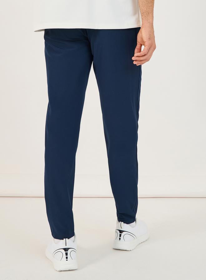 Styli 4-Way Stretch Compression Knit Slim Track Pants with Piping Detail - Image 4