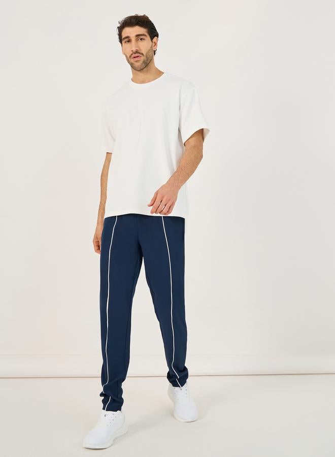 Styli 4-Way Stretch Compression Knit Slim Track Pants with Piping Detail - Image 2