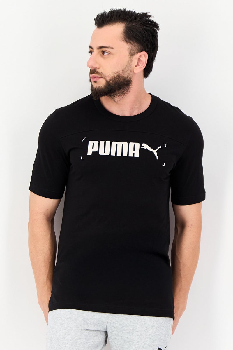 PUMA Men Sportswear Fit Short Sleeve Outdoor T-shirt, Black - Image 1